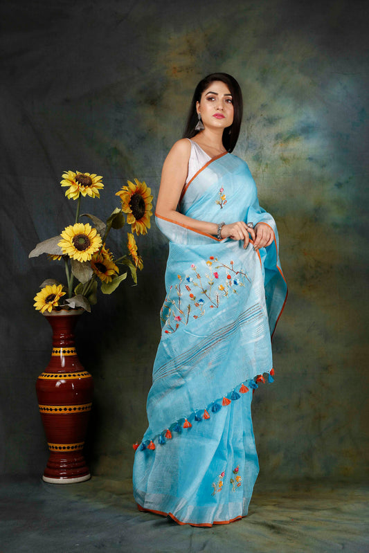 Linen Hand embroidered light blue zari saree