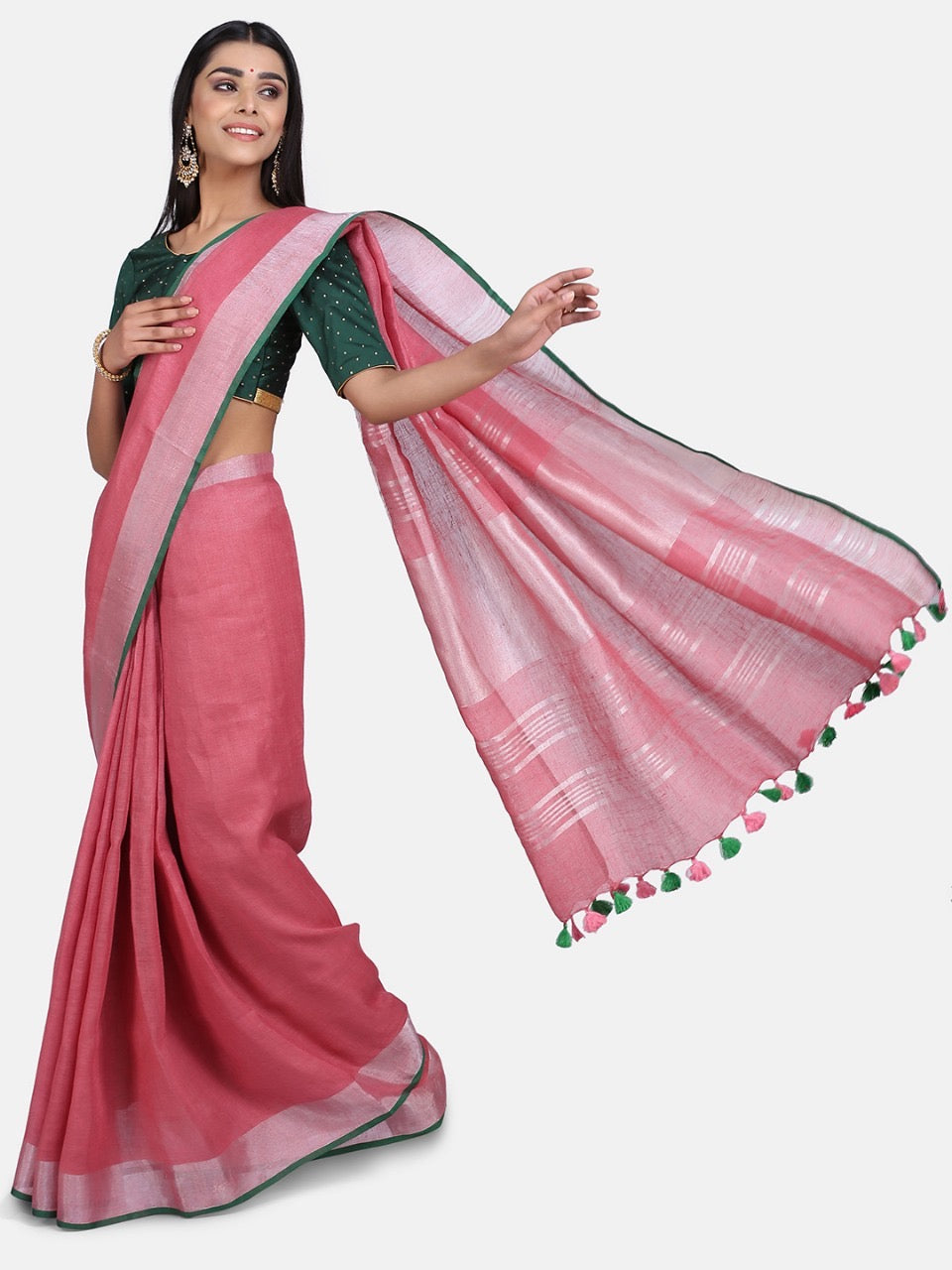 Pink Linen Saree with Green Zari Border.