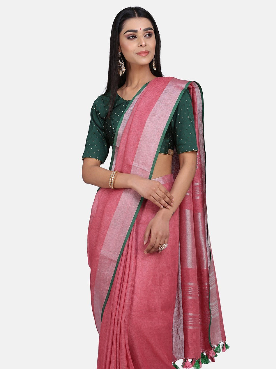 Pink Linen Saree with Green Zari Border.