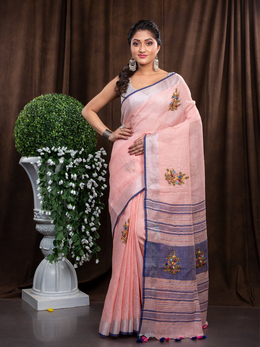 Linen hand embroidered pink and ash zari border saree
