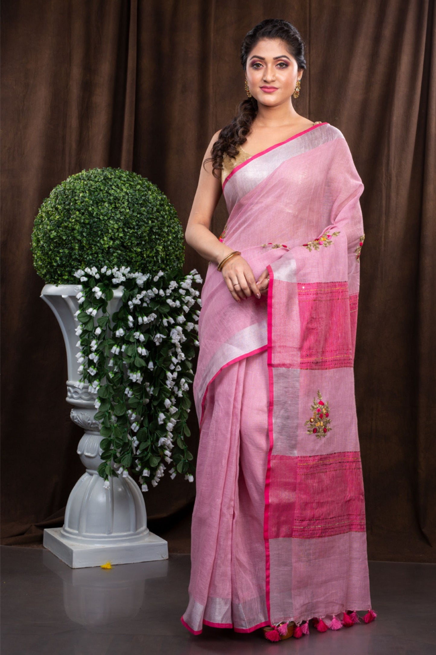 Linen hand embroidered zari pink saree