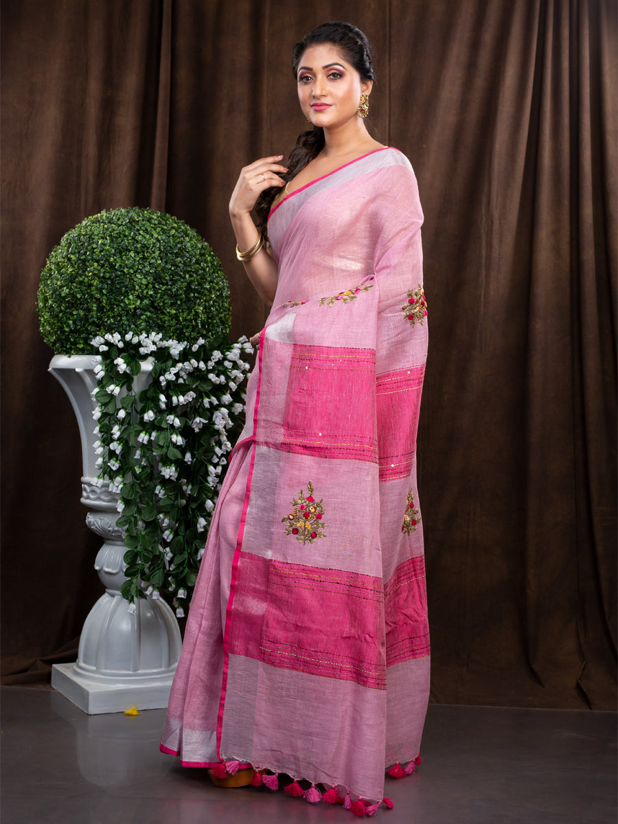 Linen hand embroidered zari pink saree