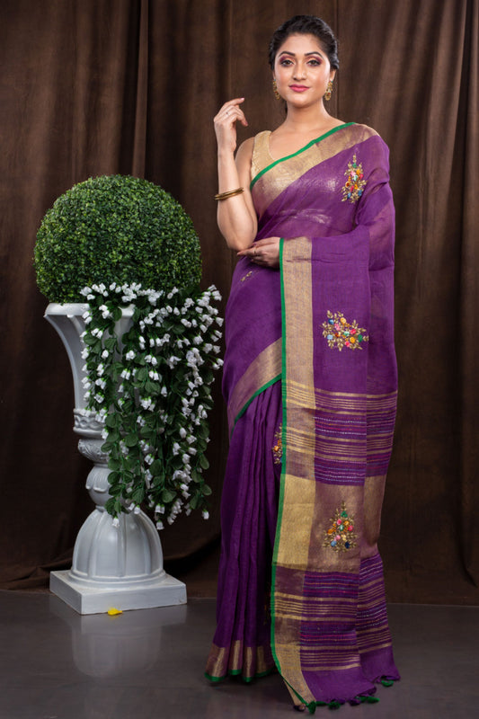 Linen hand embroidered zari purple saree