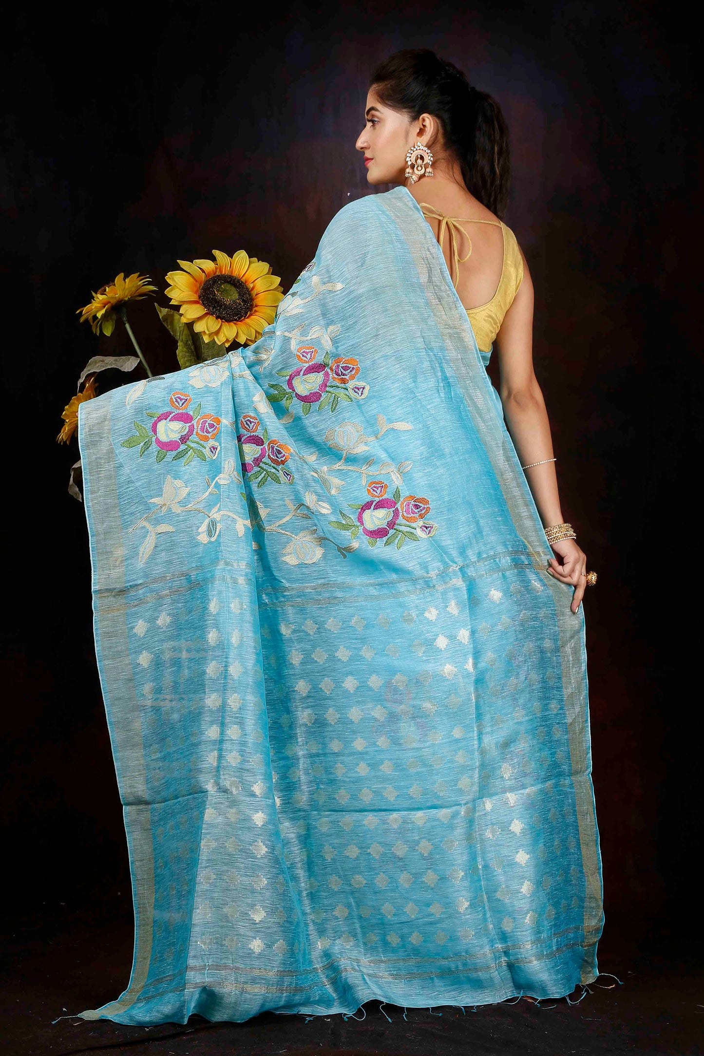 Linen hand embroidered zari sky blue saree