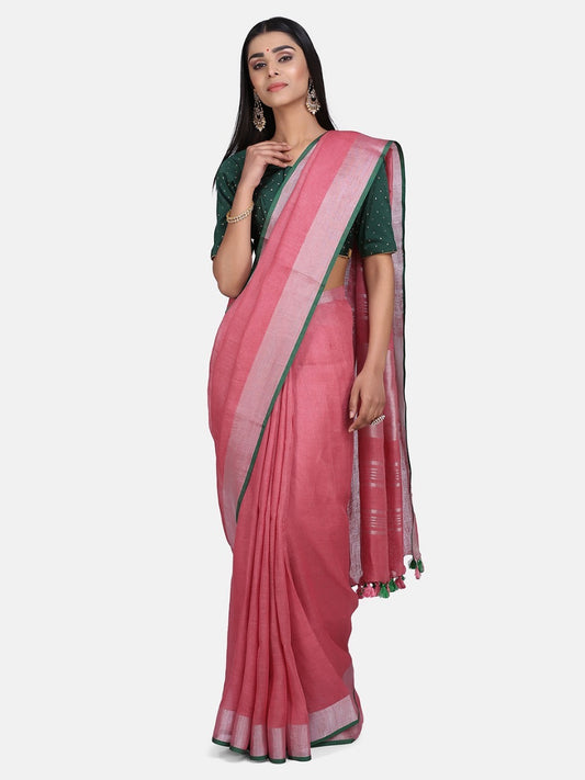 Pink Linen Saree with Green Zari Border.