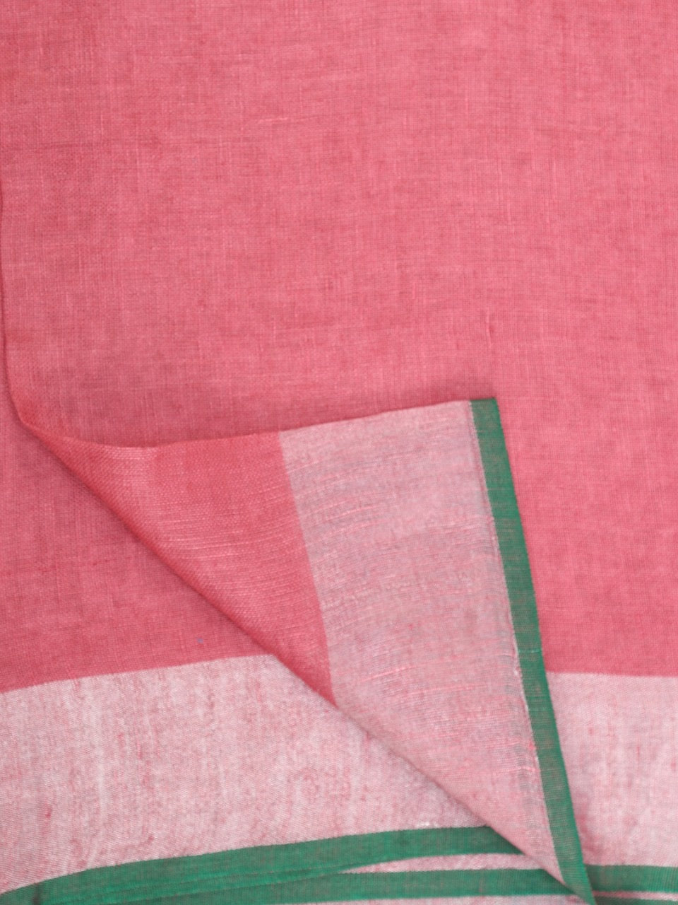 Pink Linen Saree with Green Zari Border.