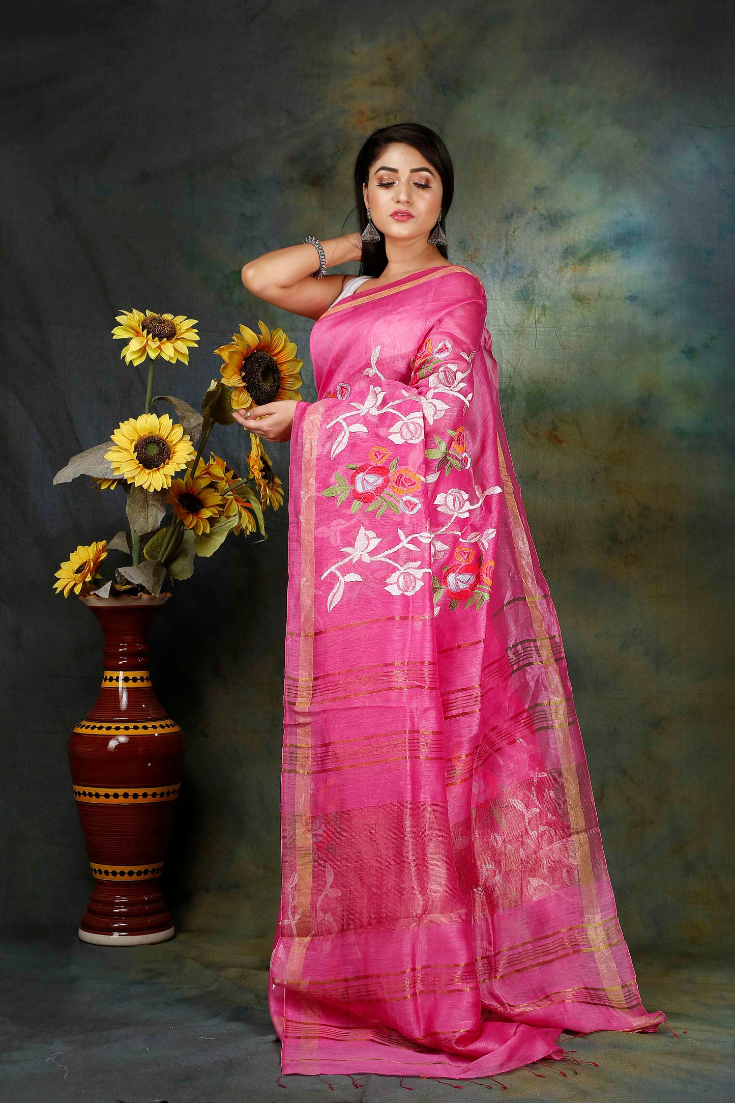 Linen hand embroidered pink saree