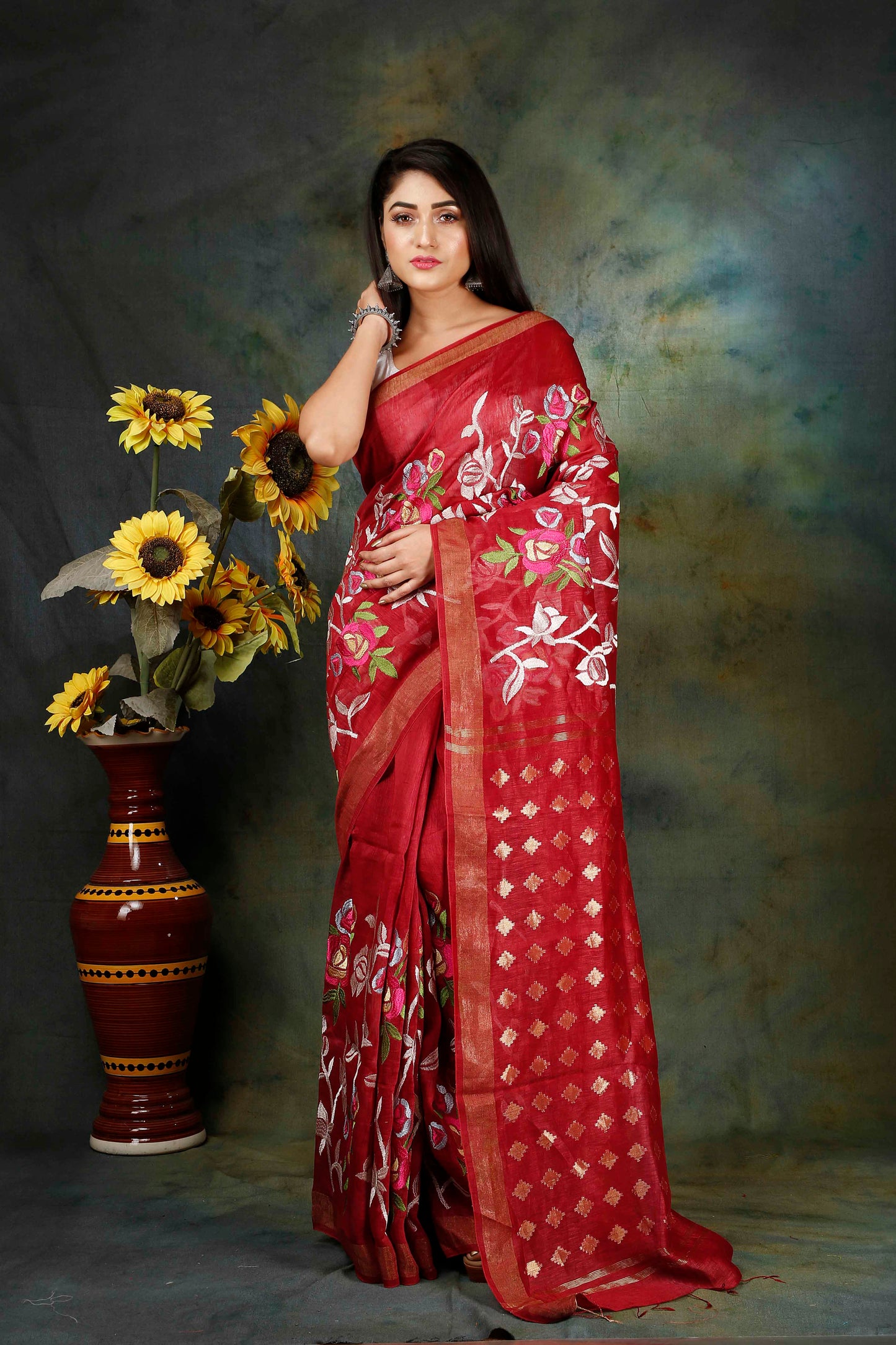 Linen hand embroidered red colour saree