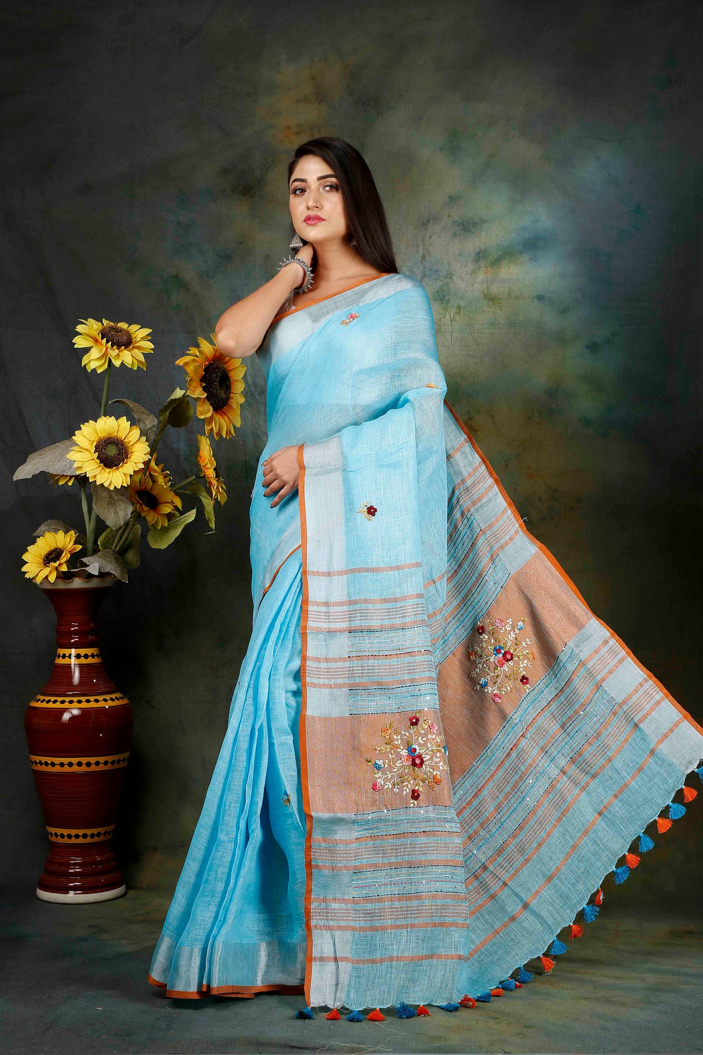 Linen hand embroidery sky blue zari saree