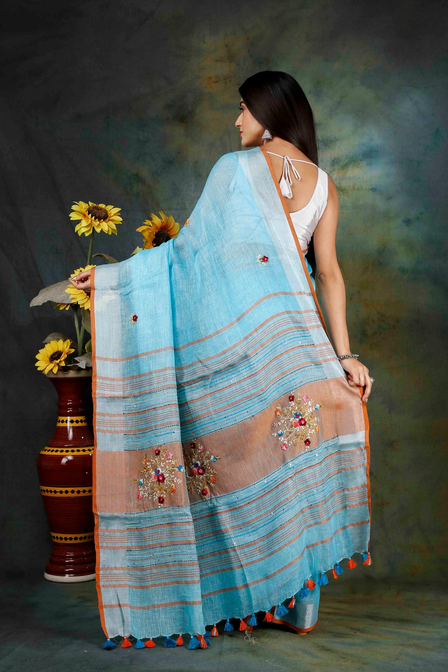 Linen hand embroidery sky blue zari saree