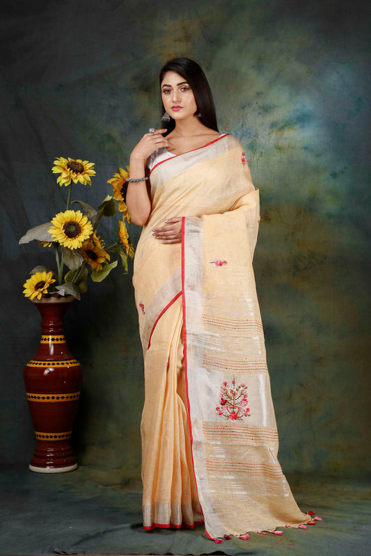 Linen Hand embroidered peach zari saree