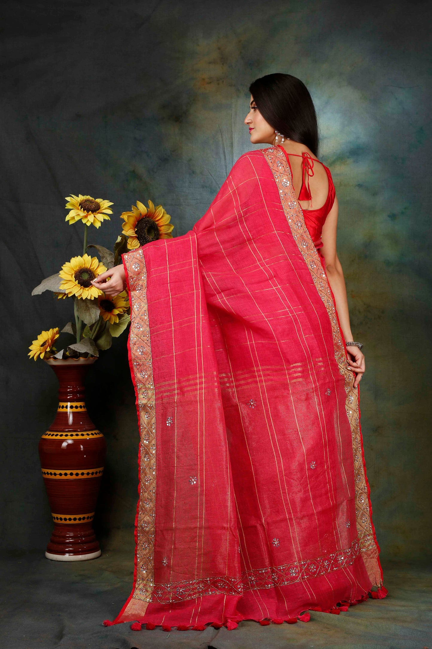 Linen hand embroidered zari dark pink saree
