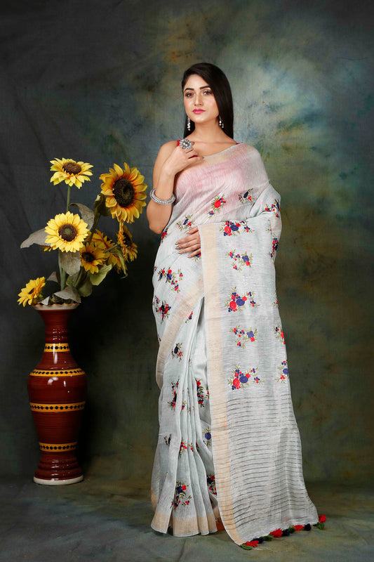 Linen hand embroidered zari saree