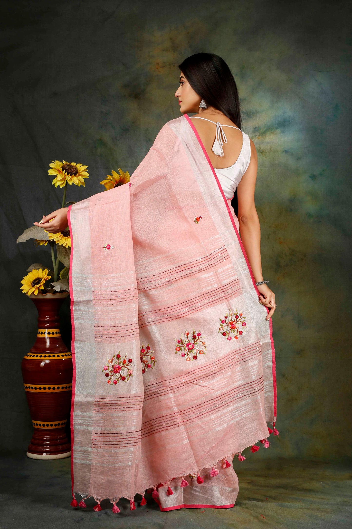 Linen Hand embroidered pink zari saree