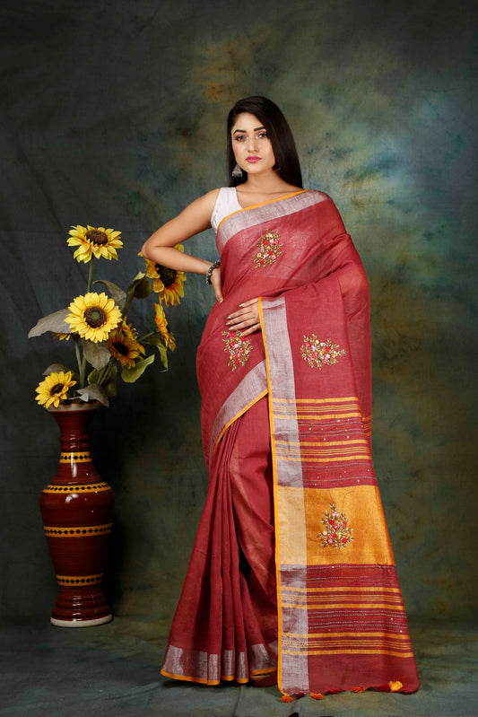 Linen Hand embroidered red zari saree