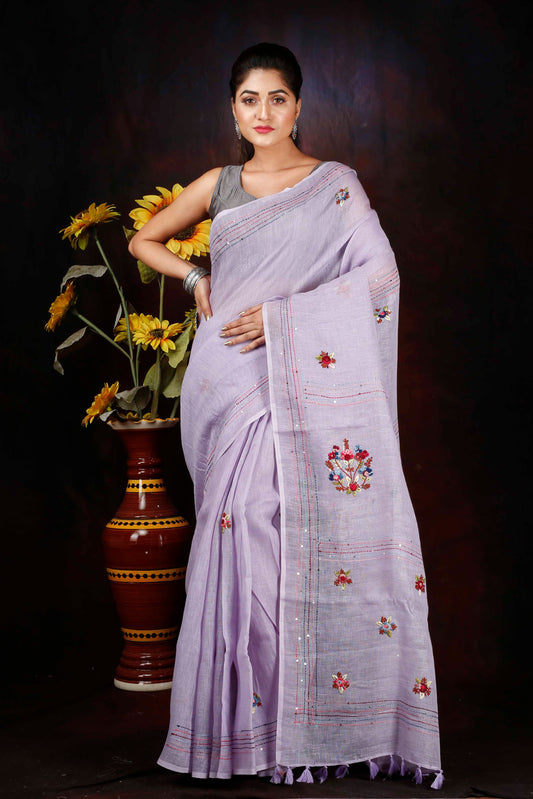 Linen hand embroidered zari saree