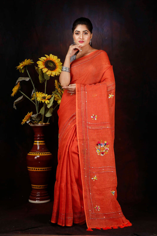 Linen hand embroidered zari orange saree