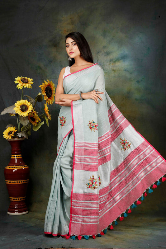 Linen Hand embroidered peach zari saree