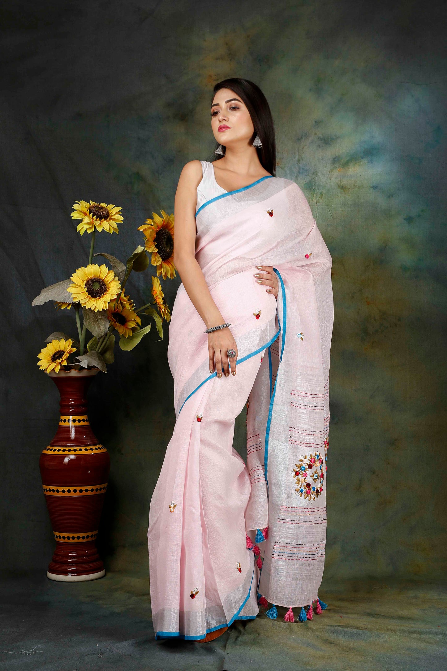 Linen Hand embroidered light pink zari saree