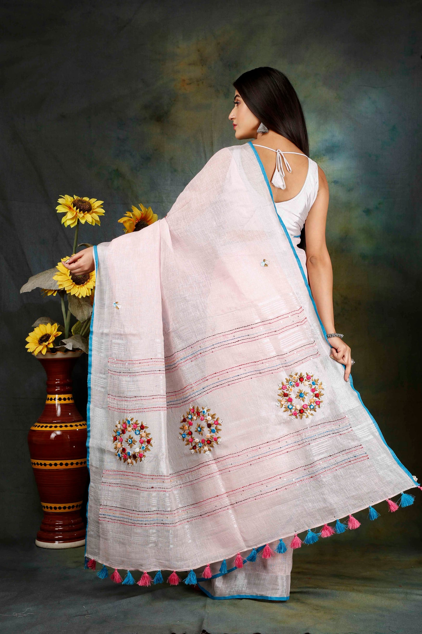 Linen Hand embroidered light pink zari saree
