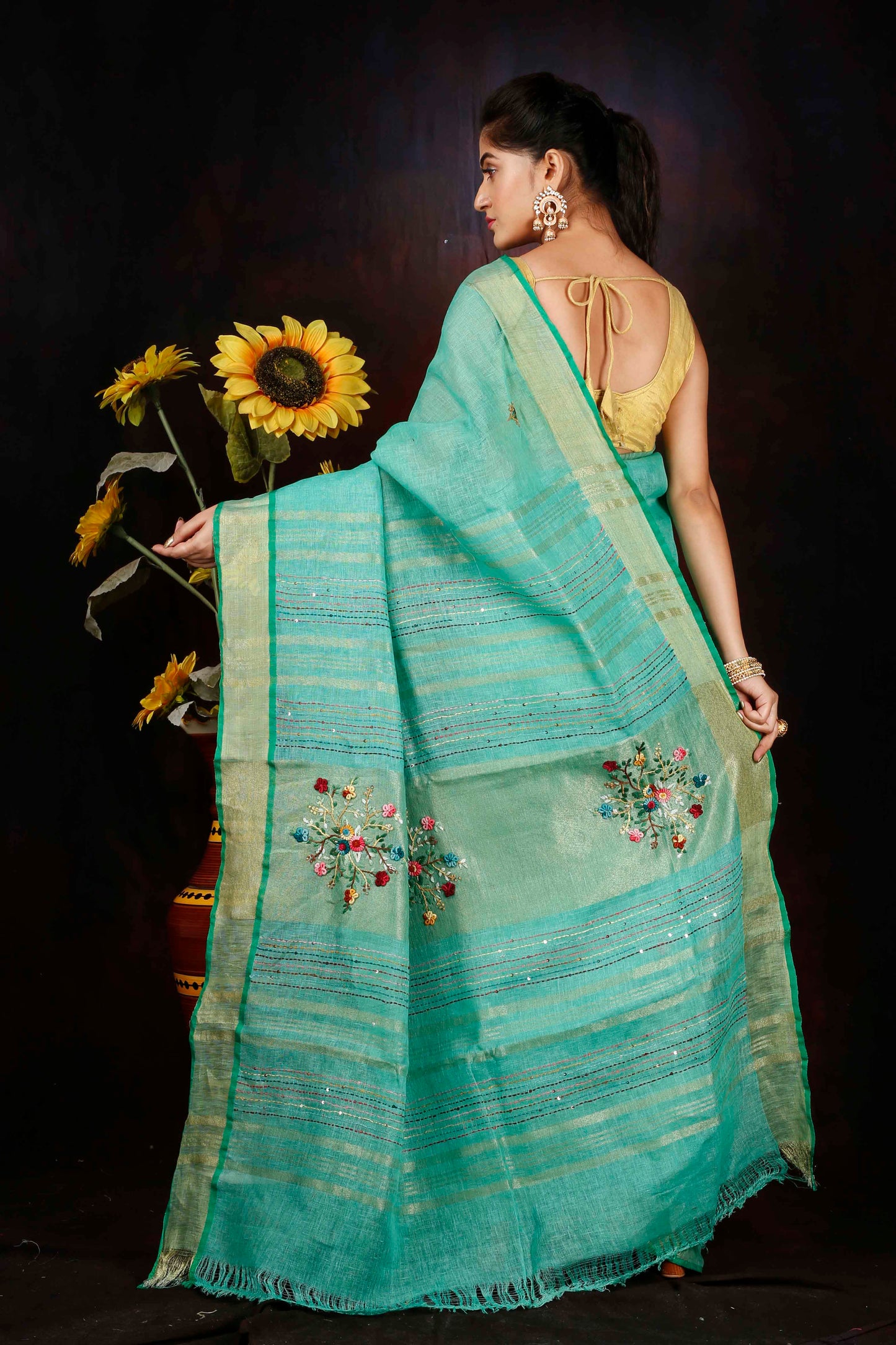 Linen hand embroidered sky colour saree